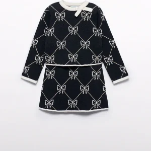 Conj. Falda tricot jacquard lazos negro